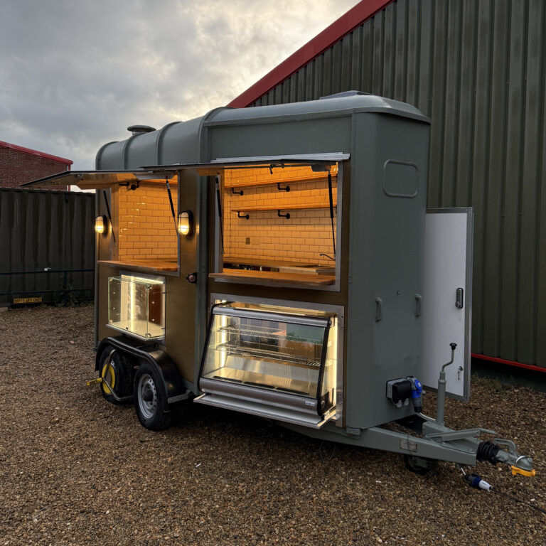 Bespoke horsebox catering trailers conversion with serving hatch and stainless steel interior